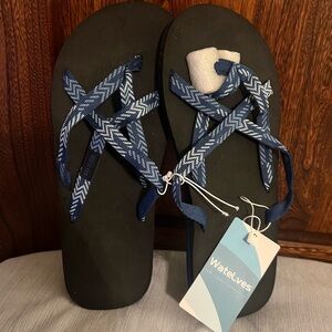 WateLves Women’s 9-9.5 Sandals with pretty blue cloth straps.  New with tag.
